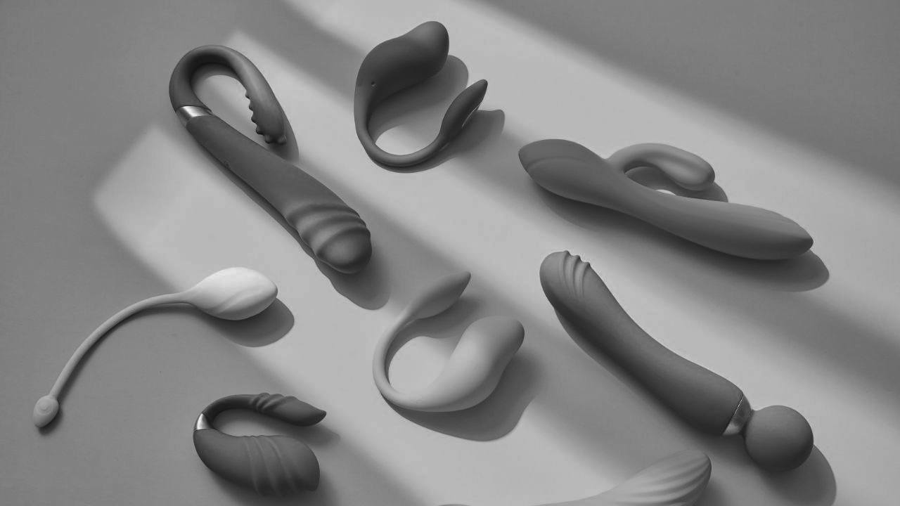 pelvic floor wands on a peach background