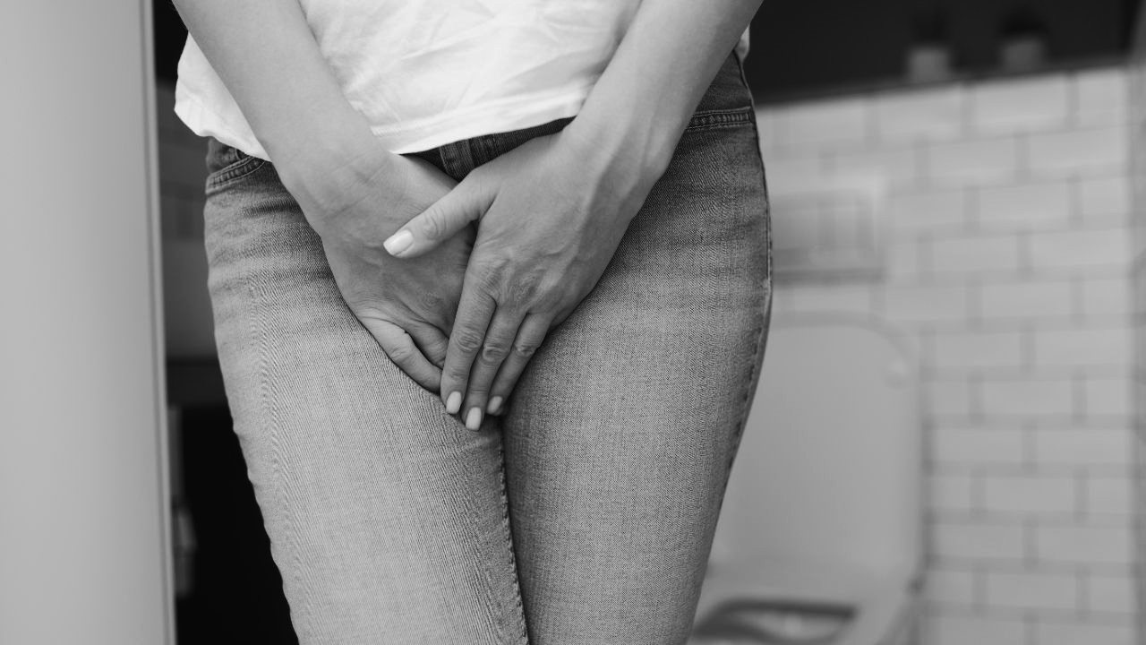 woman standing with legs crossed