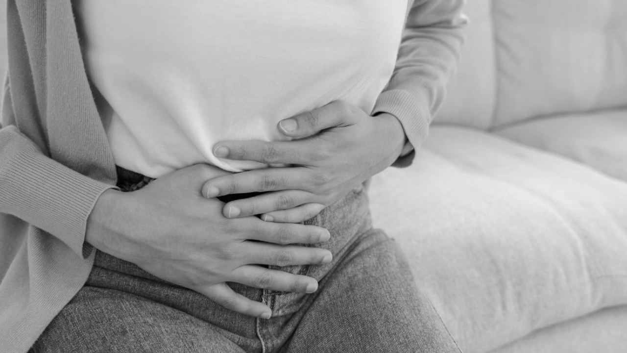 woman experiencing bladder issues and constipation related to pelvic floor health