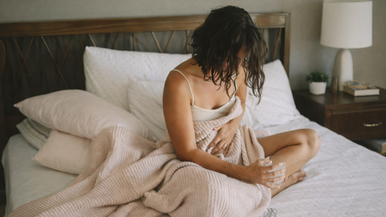 woman experiencing pelvic floor symptoms during her menstrual cycle